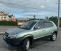 Сірий Хендай Туксон, об'ємом двигуна 2 л та пробігом 240 тис. км за 7300 $, фото 4 на Automoto.ua
