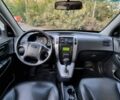 Серый Хендай Туксон, объемом двигателя 2.7 л и пробегом 209 тыс. км за 8800 $, фото 6 на Automoto.ua