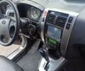 Серый Хендай Туксон, объемом двигателя 1.98 л и пробегом 258 тыс. км за 7500 $, фото 19 на Automoto.ua