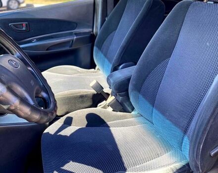 Сірий Хендай Туксон, об'ємом двигуна 2 л та пробігом 225 тис. км за 7800 $, фото 6 на Automoto.ua