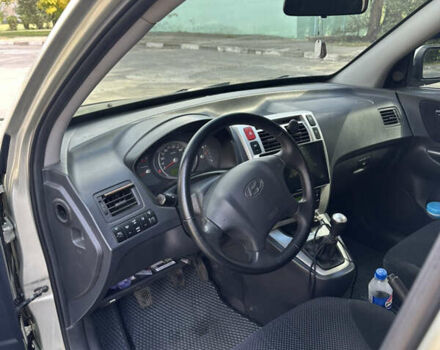Серый Хендай Туксон, объемом двигателя 2 л и пробегом 201 тыс. км за 8300 $, фото 6 на Automoto.ua