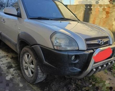 Серый Хендай Туксон, объемом двигателя 2 л и пробегом 220 тыс. км за 8000 $, фото 6 на Automoto.ua