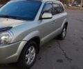 Серый Хендай Туксон, объемом двигателя 1.98 л и пробегом 205 тыс. км за 7600 $, фото 1 на Automoto.ua