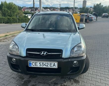 Серый Хендай Туксон, объемом двигателя 2 л и пробегом 240 тыс. км за 6500 $, фото 1 на Automoto.ua