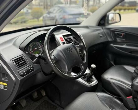 Сірий Хендай Туксон, об'ємом двигуна 2 л та пробігом 187 тис. км за 7700 $, фото 27 на Automoto.ua