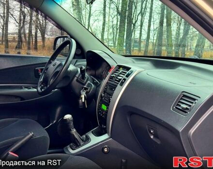 Серый Хендай Туксон, объемом двигателя 20 л и пробегом 170 тыс. км за 7700 $, фото 11 на Automoto.ua