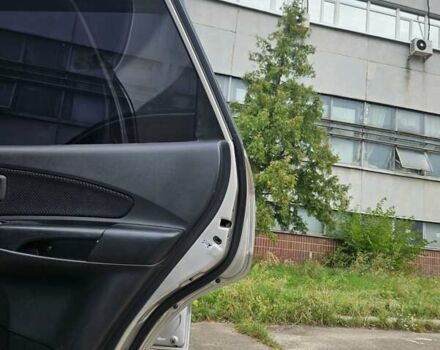 Сірий Хендай Туксон, об'ємом двигуна 1.98 л та пробігом 252 тис. км за 8000 $, фото 18 на Automoto.ua