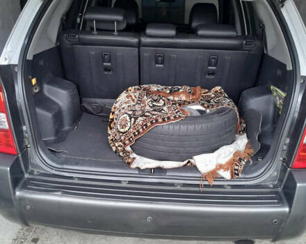 Серый Хендай Туксон, объемом двигателя 1.98 л и пробегом 240 тыс. км за 8500 $, фото 5 на Automoto.ua