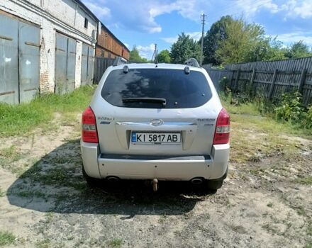 Серый Хендай Туксон, объемом двигателя 2 л и пробегом 257 тыс. км за 9000 $, фото 3 на Automoto.ua