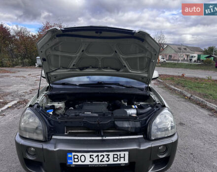 Серый Хендай Туксон, объемом двигателя 2 л и пробегом 228 тыс. км за 6900 $, фото 14 на Automoto.ua