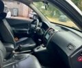 Серый Хендай Туксон, объемом двигателя 2 л и пробегом 221 тыс. км за 8500 $, фото 4 на Automoto.ua