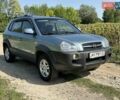 Сірий Хендай Туксон, об'ємом двигуна 1.98 л та пробігом 161 тис. км за 8900 $, фото 3 на Automoto.ua