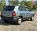 Сірий Хендай Туксон, об'ємом двигуна 1.98 л та пробігом 161 тис. км за 8900 $, фото 14 на Automoto.ua