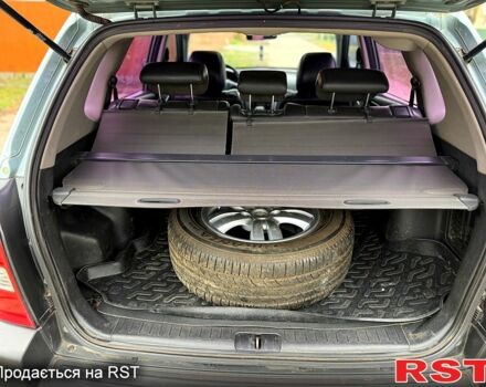 Серый Хендай Туксон, объемом двигателя 2.7 л и пробегом 228 тыс. км за 7650 $, фото 8 на Automoto.ua