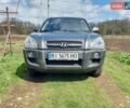 Серый Хендай Туксон, объемом двигателя 2 л и пробегом 215 тыс. км за 8500 $, фото 3 на Automoto.ua