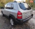 Серый Хендай Туксон, объемом двигателя 1.98 л и пробегом 171 тыс. км за 8400 $, фото 3 на Automoto.ua