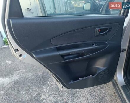 Сірий Хендай Туксон, об'ємом двигуна 1.99 л та пробігом 210 тис. км за 7600 $, фото 13 на Automoto.ua