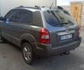 Серый Хендай Туксон, объемом двигателя 1.98 л и пробегом 258 тыс. км за 7500 $, фото 6 на Automoto.ua