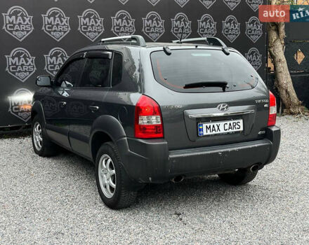 Серый Хендай Туксон, объемом двигателя 2.7 л и пробегом 239 тыс. км за 7400 $, фото 4 на Automoto.ua