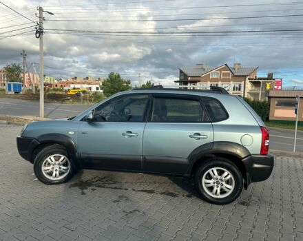 Серый Хендай Туксон, объемом двигателя 2 л и пробегом 240 тыс. км за 6500 $, фото 4 на Automoto.ua