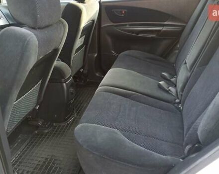 Серый Хендай Туксон, объемом двигателя 2 л и пробегом 127 тыс. км за 9300 $, фото 29 на Automoto.ua