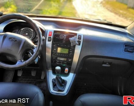 Серый Хендай Туксон, объемом двигателя 2 л и пробегом 190 тыс. км за 8500 $, фото 8 на Automoto.ua