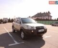 Серый Хендай Туксон, объемом двигателя 1.98 л и пробегом 180 тыс. км за 7800 $, фото 1 на Automoto.ua