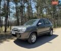 Серый Хендай Туксон, объемом двигателя 1.98 л и пробегом 147 тыс. км за 8900 $, фото 1 на Automoto.ua