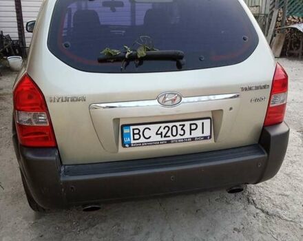 Сірий Хендай Туксон, об'ємом двигуна 1.98 л та пробігом 264 тис. км за 7600 $, фото 2 на Automoto.ua