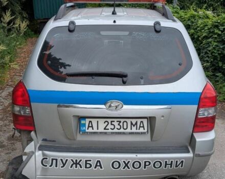 Серый Хендай Туксон, объемом двигателя 2 л и пробегом 220 тыс. км за 2000 $, фото 5 на Automoto.ua