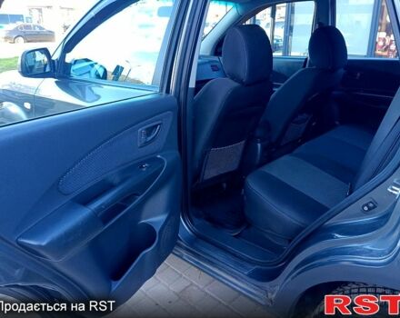 Сірий Хендай Туксон, об'ємом двигуна 2 л та пробігом 216 тис. км за 8200 $, фото 4 на Automoto.ua