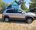 Серый Хендай Туксон, объемом двигателя 2 л и пробегом 118 тыс. км за 8800 $, фото 1 на Automoto.ua