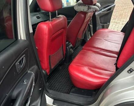 Серый Хендай Туксон, объемом двигателя 2 л и пробегом 330 тыс. км за 6200 $, фото 2 на Automoto.ua