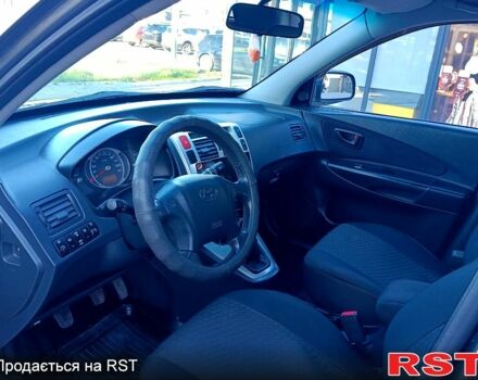 Сірий Хендай Туксон, об'ємом двигуна 2 л та пробігом 216 тис. км за 8200 $, фото 7 на Automoto.ua