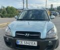 Серый Хендай Туксон, объемом двигателя 2 л и пробегом 240 тыс. км за 6500 $, фото 1 на Automoto.ua