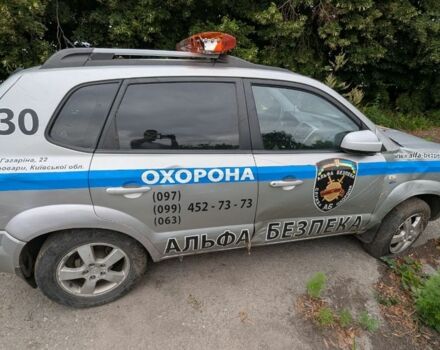 Серый Хендай Туксон, объемом двигателя 2 л и пробегом 220 тыс. км за 2000 $, фото 7 на Automoto.ua