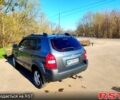Серый Хендай Туксон, объемом двигателя 2 л и пробегом 210 тыс. км за 7200 $, фото 6 на Automoto.ua