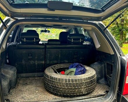 Серый Хендай Туксон, объемом двигателя 2 л и пробегом 221 тыс. км за 8500 $, фото 7 на Automoto.ua