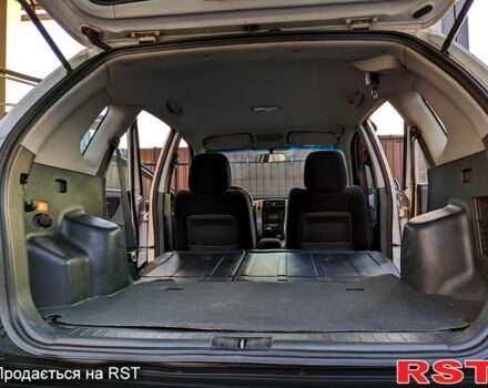 Серый Хендай Туксон, объемом двигателя 2 л и пробегом 195 тыс. км за 8800 $, фото 6 на Automoto.ua