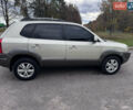 Серый Хендай Туксон, объемом двигателя 2 л и пробегом 228 тыс. км за 6900 $, фото 3 на Automoto.ua