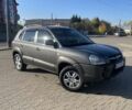 Серый Хендай Туксон, объемом двигателя 2 л и пробегом 220 тыс. км за 7950 $, фото 1 на Automoto.ua