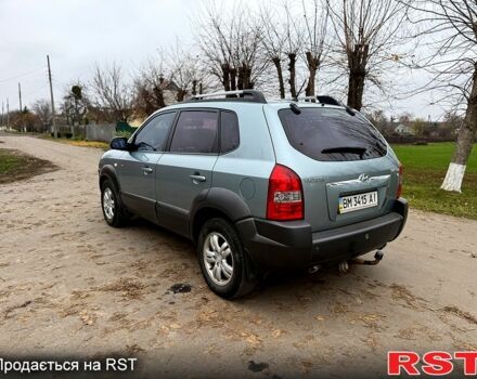 Серый Хендай Туксон, объемом двигателя 2.7 л и пробегом 228 тыс. км за 7650 $, фото 2 на Automoto.ua