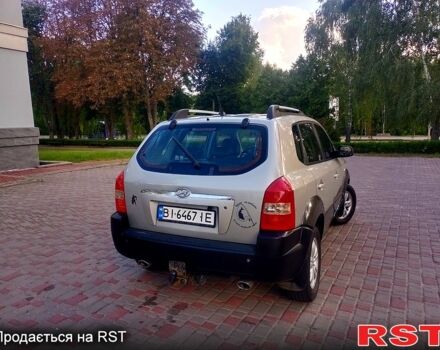Серый Хендай Туксон, объемом двигателя 2.7 л и пробегом 280 тыс. км за 6500 $, фото 1 на Automoto.ua