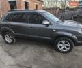 Серый Хендай Туксон, объемом двигателя 2 л и пробегом 197 тыс. км за 8700 $, фото 1 на Automoto.ua