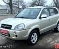 Серый Хендай Туксон, объемом двигателя 2 л и пробегом 240 тыс. км за 7800 $, фото 1 на Automoto.ua