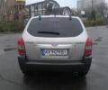 Сірий Хендай Туксон, об'ємом двигуна 2 л та пробігом 215 тис. км за 7750 $, фото 7 на Automoto.ua