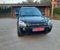 Серый Хендай Туксон, объемом двигателя 1.98 л и пробегом 206 тыс. км за 8600 $, фото 1 на Automoto.ua