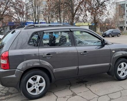 Серый Хендай Туксон, объемом двигателя 2 л и пробегом 95 тыс. км за 8800 $, фото 4 на Automoto.ua