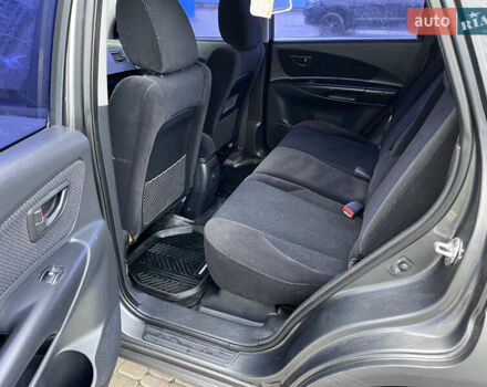 Серый Хендай Туксон, объемом двигателя 2 л и пробегом 198 тыс. км за 8900 $, фото 5 на Automoto.ua