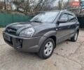 Сірий Хендай Туксон, об'ємом двигуна 1.98 л та пробігом 262 тис. км за 7999 $, фото 1 на Automoto.ua